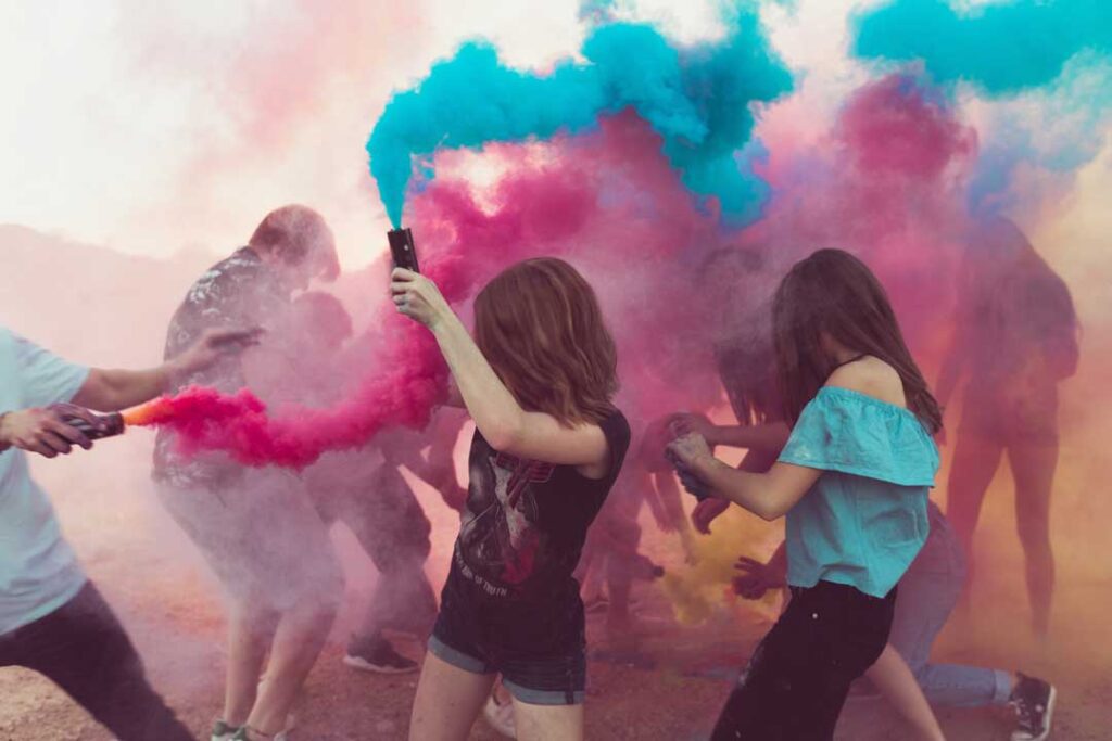 group of teens with spray bottles